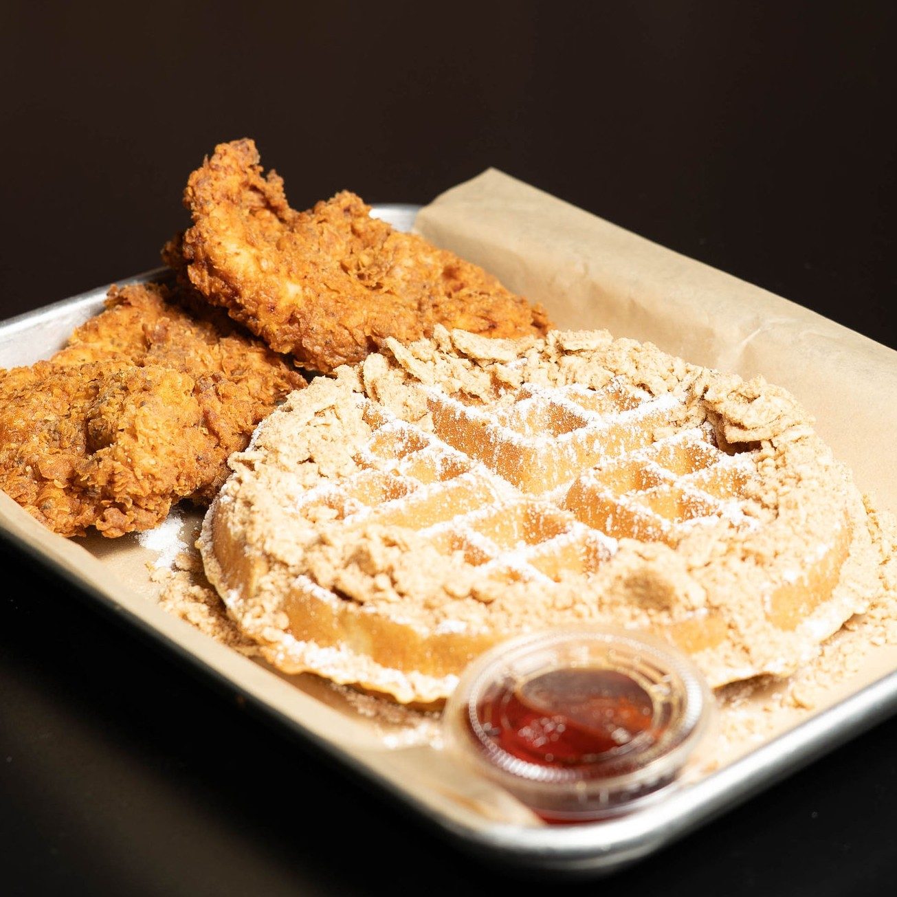 Cinnamon Toast Crunch Waffle W\ 2 Handbreaded Chicken Tenders.